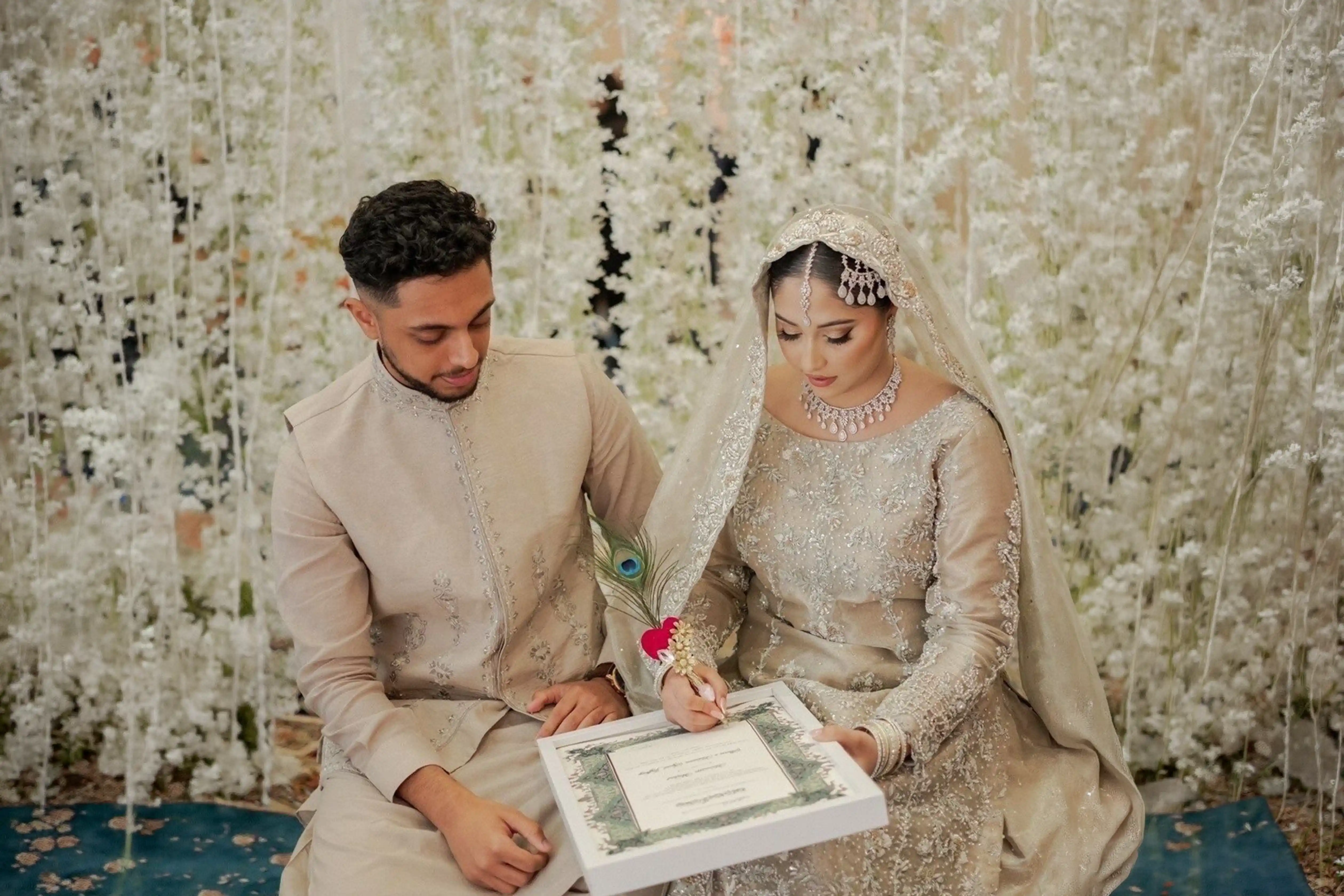 Muslim bride in white hijab nikah